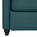 Fabric detail | Close view of the Caribbean Blue woven upholstery, seat edge, lower apron, and turned foot