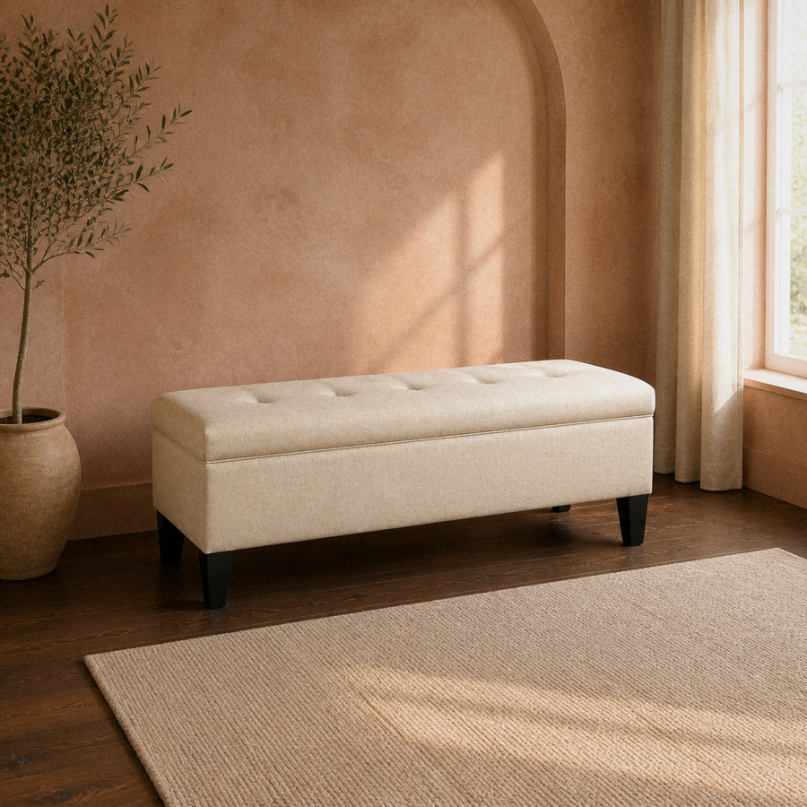 Clay entry room | Beige tufted storage bench beside terracotta limewash wall and walnut floor