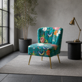 Cool loft | teal-blue floral velvet armless slipper chair on a plain dove-gray rug beside a black side table and window