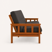 Studio | Full left side studio profile showing the slatted arm, reclined back support, square legs, and sofa depth