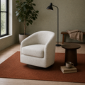 Room angle | oatmeal swivel chair at three-quarter view on a rust rug in the sage reading room