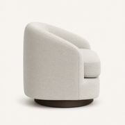 Side | right side and curved outer back of the oatmeal swivel chair on an off-white studio ground