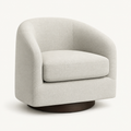 Studio angle | oatmeal swivel barrel chair at three-quarter view showing curved arms, cushion, and dark round base