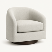 Studio angle | oatmeal swivel barrel chair at three-quarter view showing curved arms, cushion, and dark round base