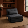 In a room | dark charcoal convertible chair upright with the ottoman cushion tucked beneath the seat in a clay library room