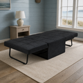 In a room | flat dark charcoal convertible sleeper in a coastal-blue guest room