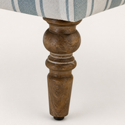 Hardware | close-up of a dark turned rubberwood leg, lower rail and black foot