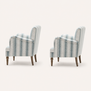 Side | side and rear studio view showing the depth, arched backs and dark turned legs of both chairs