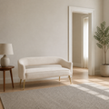 In scale | Beige velvet loveseat beside a fully visible interior doorway