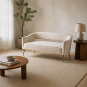 Warm cream room angle | Beige velvet flared loveseat with gold metal legs