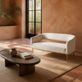 Terracotta garden room | Beige velvet flared loveseat with gold metal legs