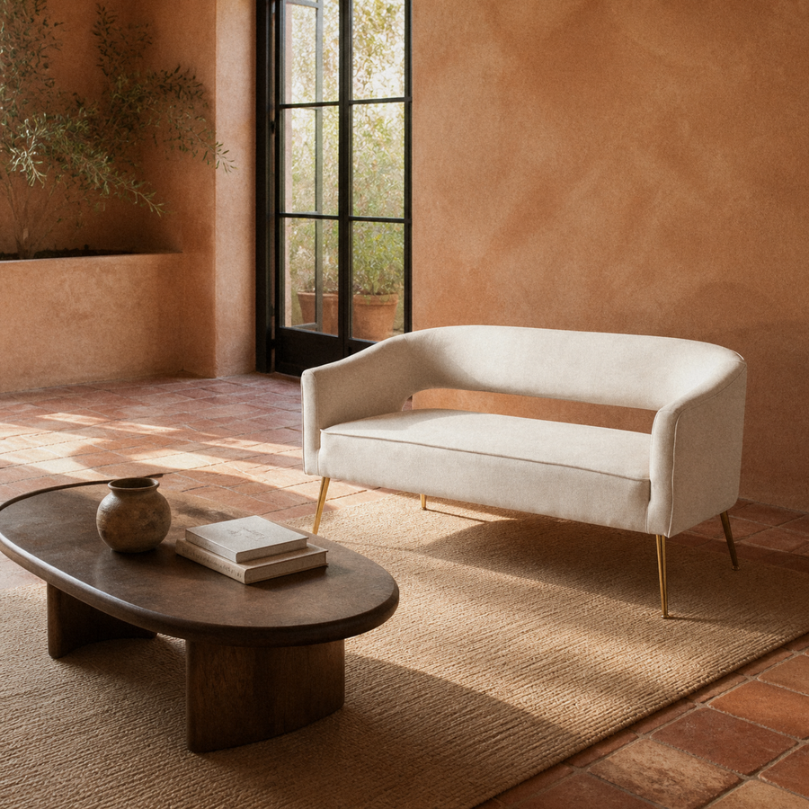 Terracotta garden room | Beige velvet flared loveseat with gold metal legs