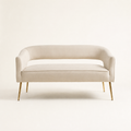 Studio front | Beige velvet flared loveseat with a curved open back and gold metal legs