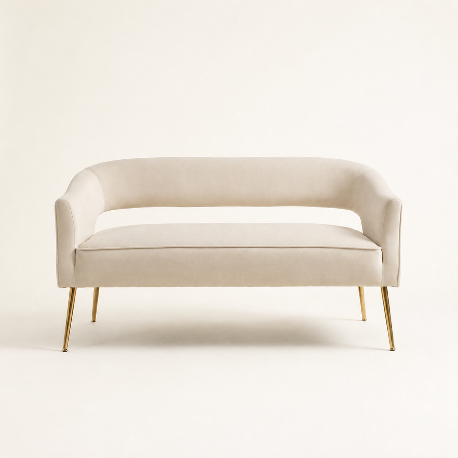 Studio front | Beige velvet flared loveseat with a curved open back and gold metal legs