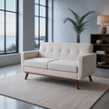 Room | Beige linen loveseat in a cool coastal loft with tall black-framed windows