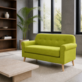 Cool stone room | vivid lime-green tufted loveseat with rolled arms and natural birch legs