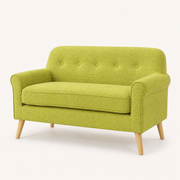 Studio angle | vivid lime-green tufted loveseat from the front right showing the rolled arm and side profile