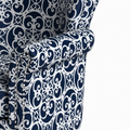 Detail | close view of the rolled arm edge and curved rows of bright silver nailheads