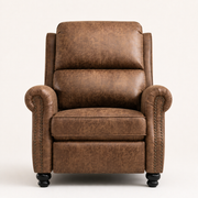 Studio front | brown mottled faux-leather push-back recliner with two padded back cushions, rolled arms, dark nailheads, and black turned bun feet
