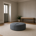 Scale | ottoman in an entry sitting room with a full-height doorway showing scale