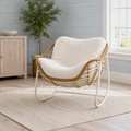 Coastal blue-gray room | white metal rocking chair with wicker rim and cream boucle cushion