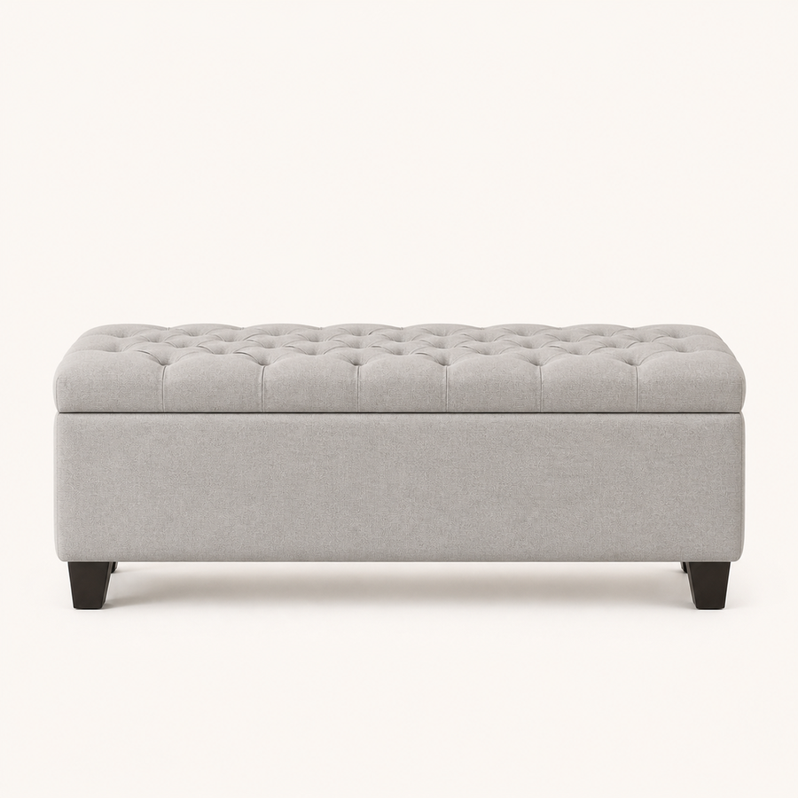 Front | light gray polyester storage ottoman in a clean studio front view, diamond tufting on the flip top, plain body, and four tapered dark wood legs