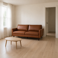 Scale | Mid-brown faux leather sofa beside a full-height doorway in a bright room