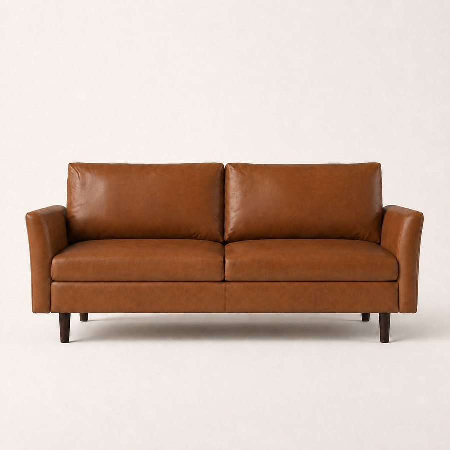 Front | Mid-brown faux leather sofa with flared arms and two loose back cushions on a clean studio ground
