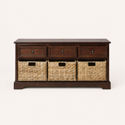 Front | front studio view of dark cherry storage bench with three knobbed drawers and three tan woven baskets