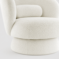Swivel-base close-up | cream white boucle upholstery and wrapped drum pedestal at the seat-to-base transition