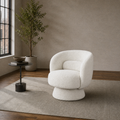 Room one angle | cream white boucle swivel chair turned to show its rounded side and pedestal base