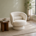 Room three | cream white boucle swivel barrel chair in a soft sage modern living room