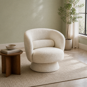 Room three | cream white boucle swivel barrel chair in a soft sage modern living room