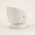 Studio side | cream white boucle swivel chair showing its rounded rear profile and wrapped pedestal base