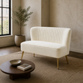 Living room | Ivory velvet armless loveseat in a warm stone-toned open-plan room