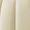 Texture | Ivory velvet upholstery with a vertical channel seam