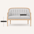 Seat dimensions | Black tufted loveseat labeled with an 18.5-inch seat height and 19.75-inch seat depth