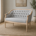 Room | Midnight black button-tufted faux leather loveseat with antique-natural birch frame in a cool gray city living room