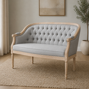 Room | Midnight black button-tufted faux leather loveseat with antique-natural birch frame in a cool gray city living room