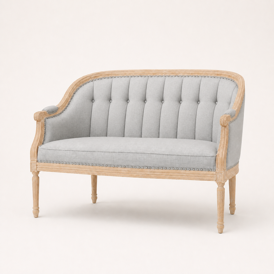 Front | Midnight black button-tufted faux leather loveseat with scrolled birch arms and four turned legs, straight on
