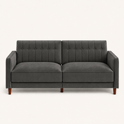 Front | Gray velvet convertible sofa on a paper studio ground, straight on, chevron-tufted split back