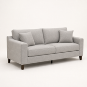 Studio | Three-quarter view of the light gray chenille sofa, showing the left square arm, two cushions, and brown wood legs