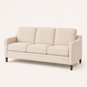 Studio angle | beige sofa showing the sloped arms and full seat depth