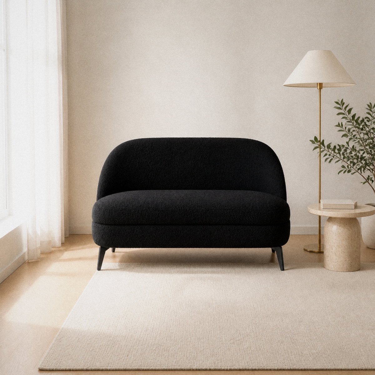 Warm living room | Black boucle armless loveseat with a rounded back and slim black metal legs
