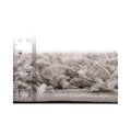 Pile depth | the pile from the side against an inch and centimeter ruler
