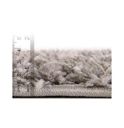 Pile depth | the pile from the side against an inch and centimeter ruler