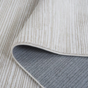 Close up | the pile and non-slip backing, folded back to show both