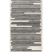 Full rug | the whole rug flat on a plain backdrop, no furniture