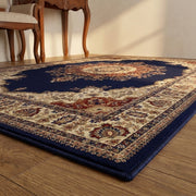 Angled view | the central medallion and border seen across the rug
