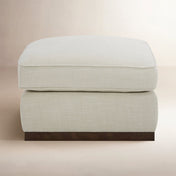 Upholstered Rectangular Ottoman with Walnut Finish Plinth Base